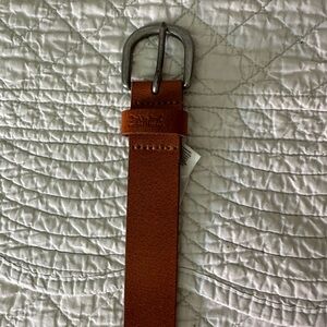 Levi’s leather belt, gently worn.
